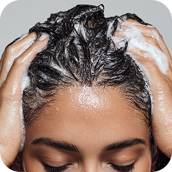 Apply evenly along the length of towel-dried or dry hair.